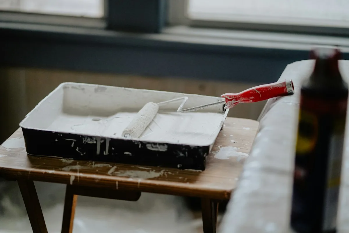 Paint roller and tray ready for interior painting